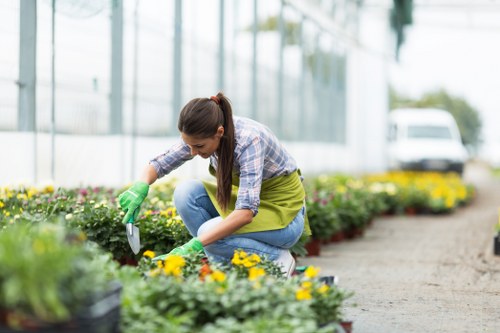 Operators using protective equipment while gardening
